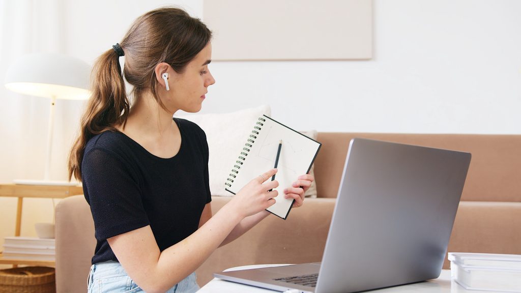 woman calling for more online team building games for remote employees