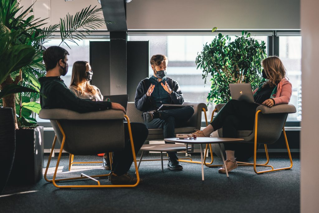 DeskTime team discussing project deliverables