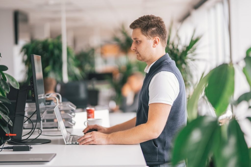 Man using his laptop in office