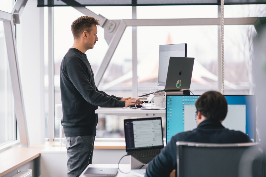 Man using a standing desk