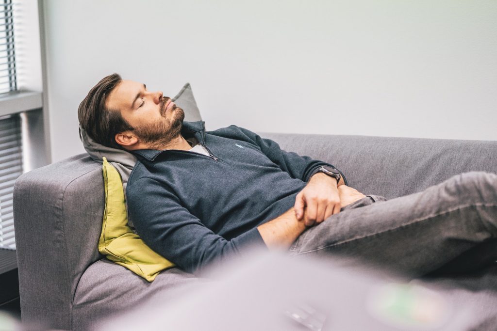 Man sleeping on a couch