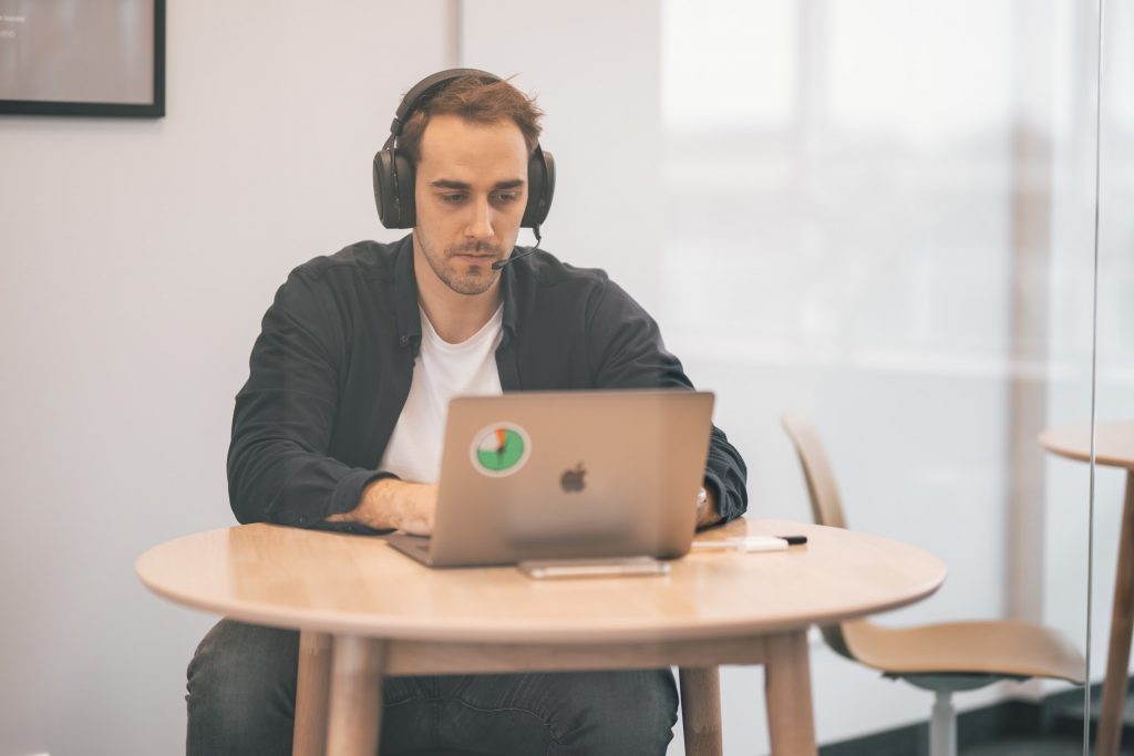 man on a video call with headphones on