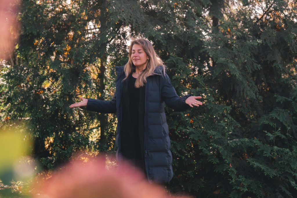 A person meditating outside 