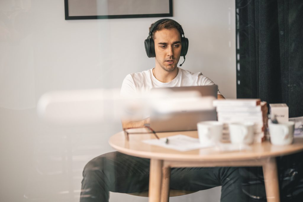 A hybrid worker in a video meeting