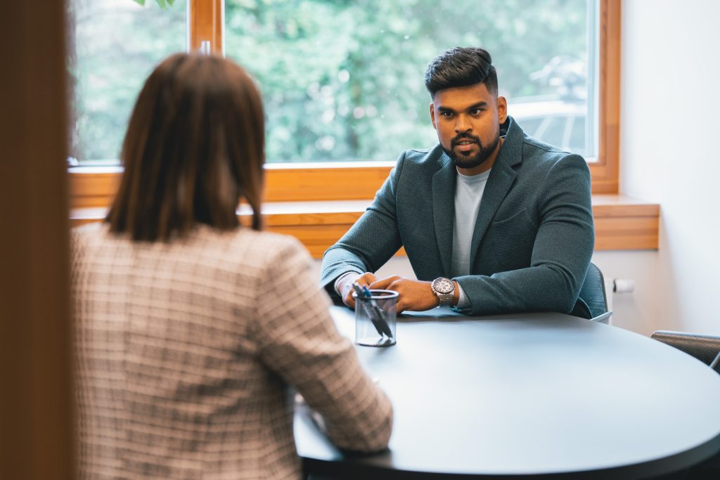 two people talking at the office