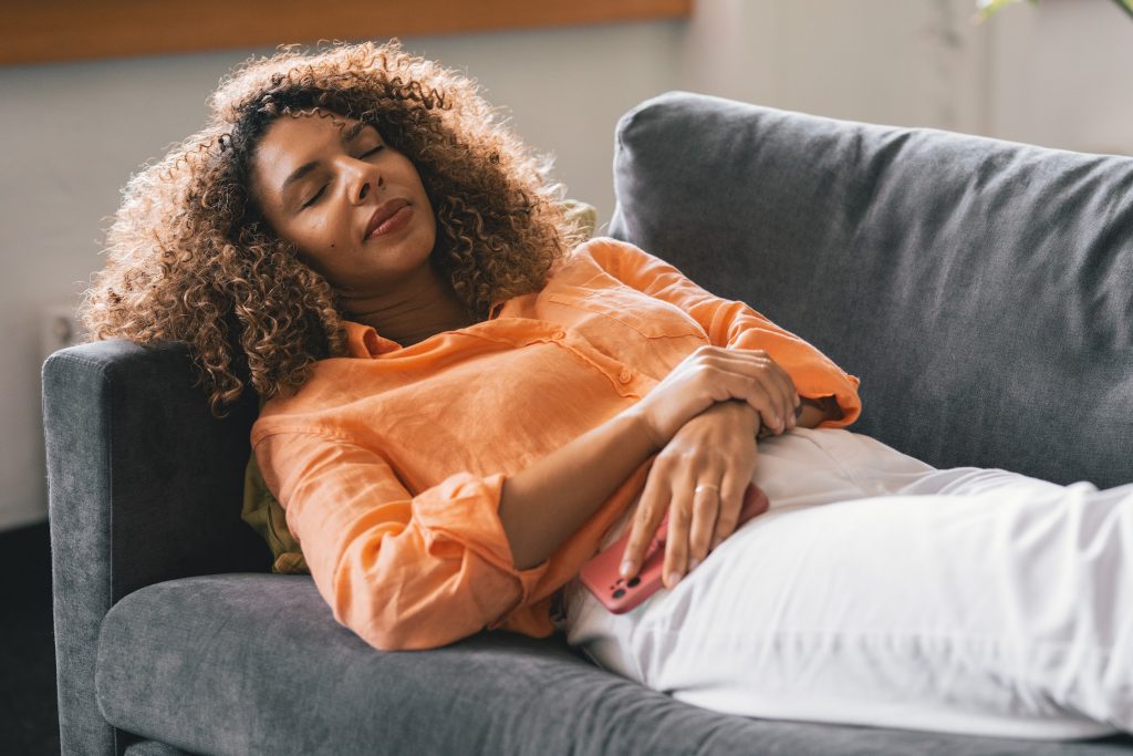 A female worker taking a power nap in the office