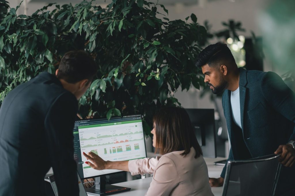 three employees observing impact of google calendar extension