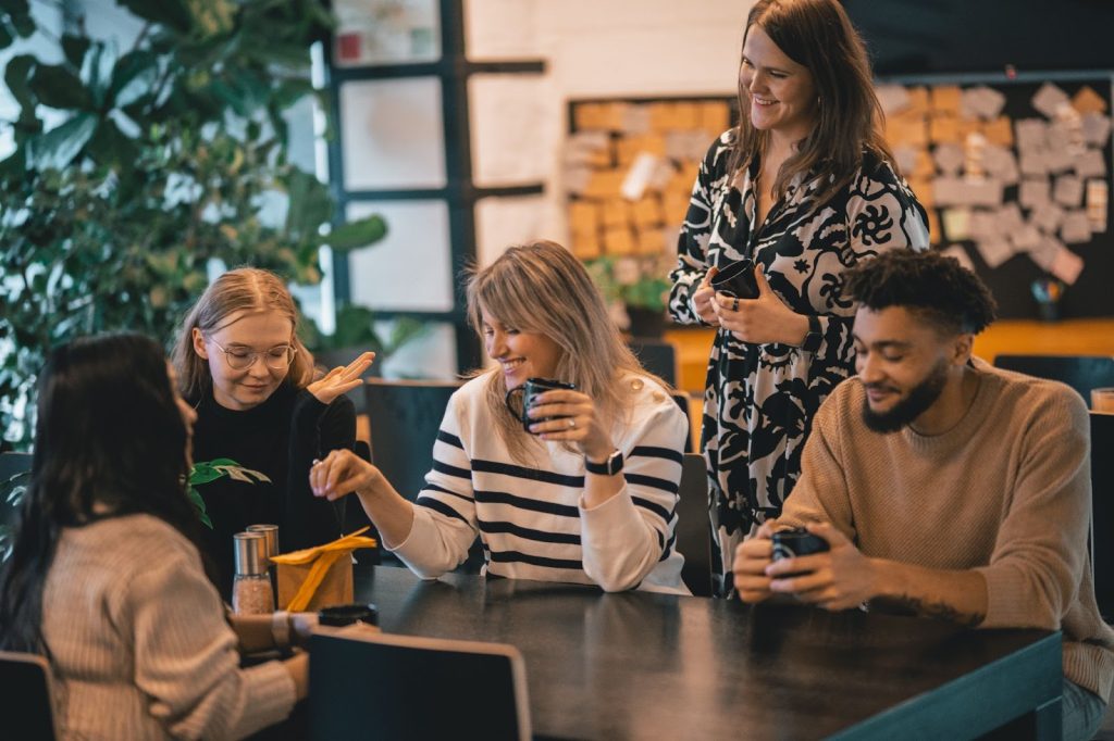 team discussing what is remote work culture