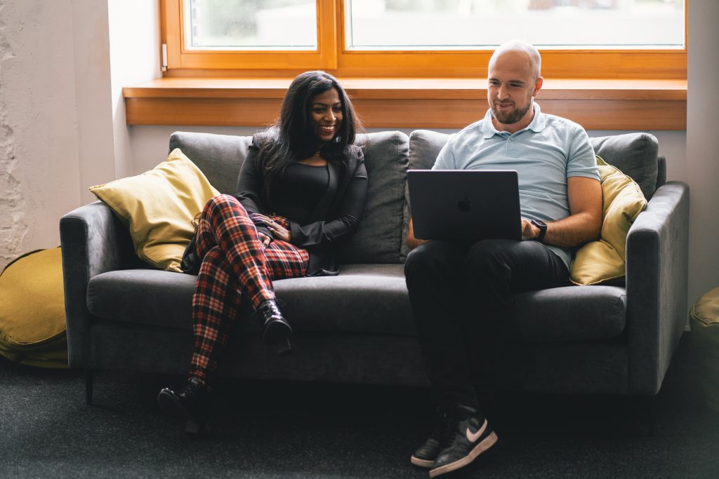 Man showing woman unproductive apps