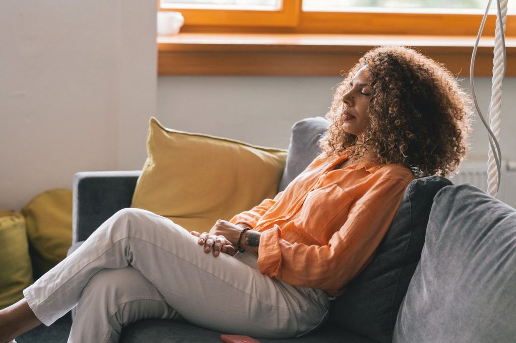 woman practicing mindfulness as part of her sunday reset routine