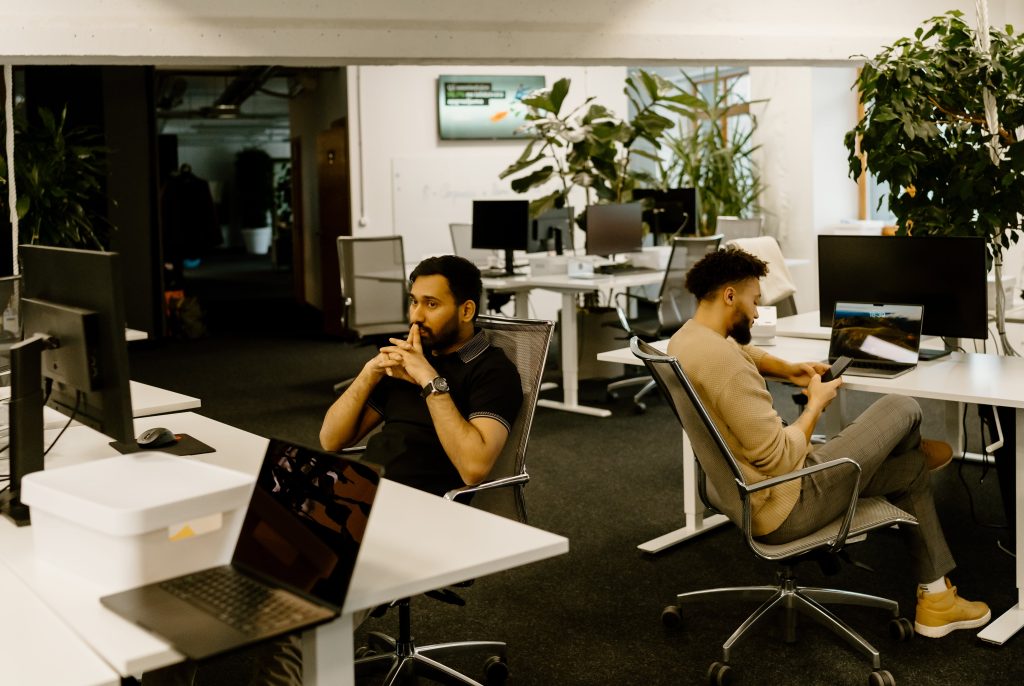 two men killing time in office