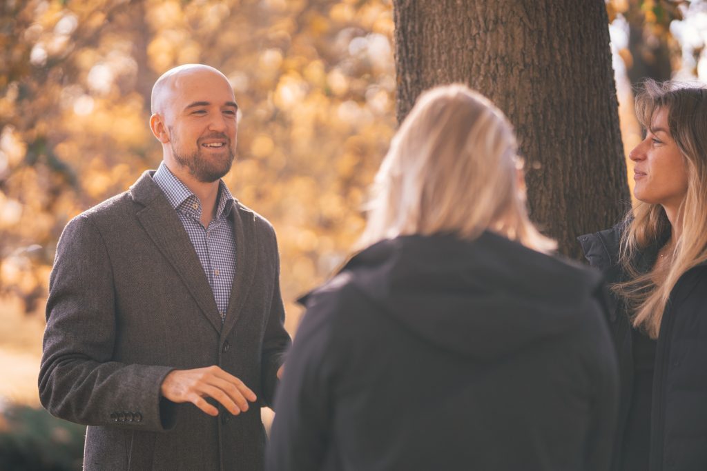 man showing holiday celebration ideas for work