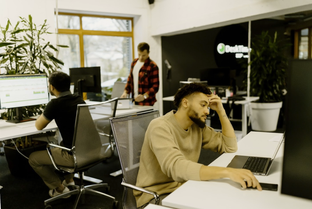 Man struggling with managing productivity in the workplace